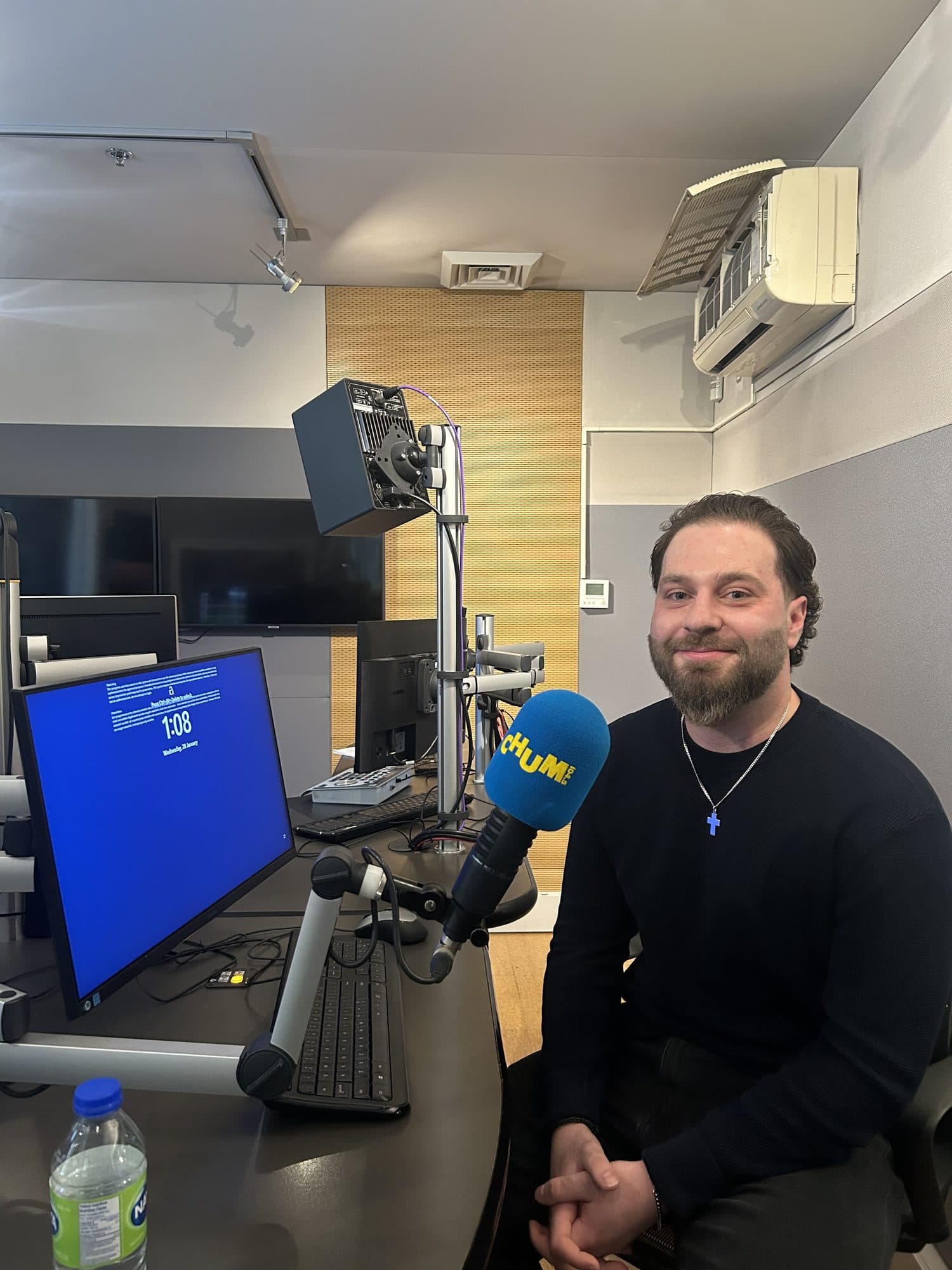 Michael Argyrides on-air during a radio interview